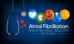 A stethoscope next to three red hearts and symbols above Atrial Fibrillation Awareness Month September.